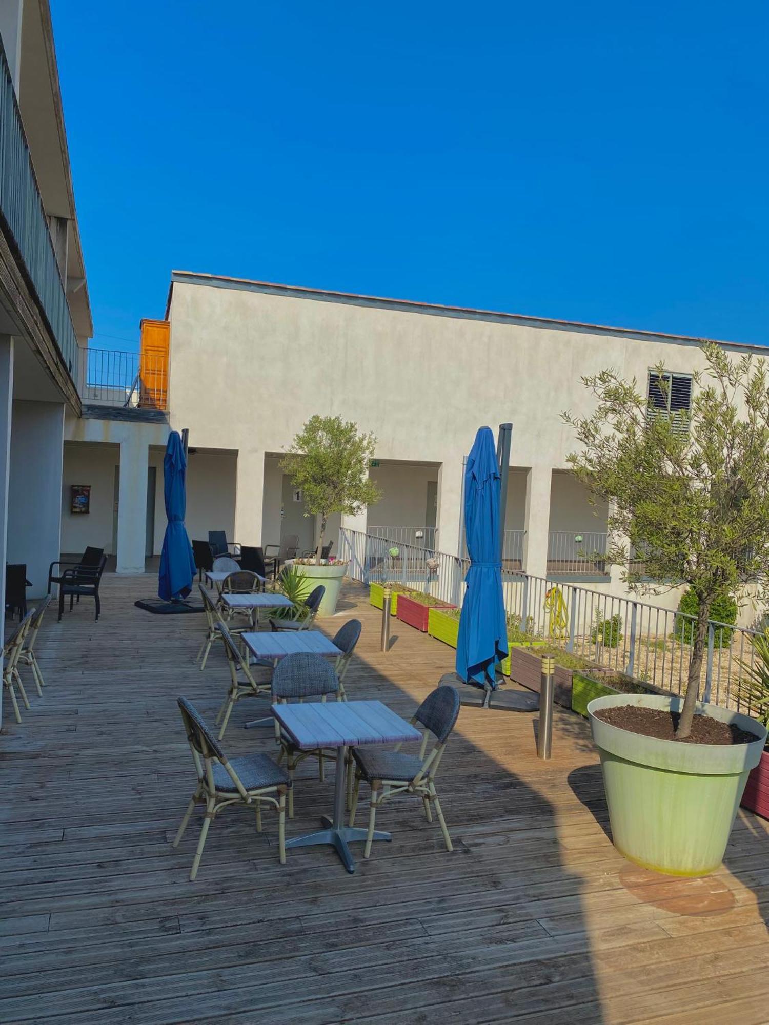 Douce France Hotel Cuxac-d'Aude Bagian luar foto