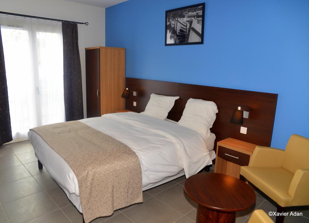 Douce France Hotel Cuxac-d'Aude Bagian luar foto