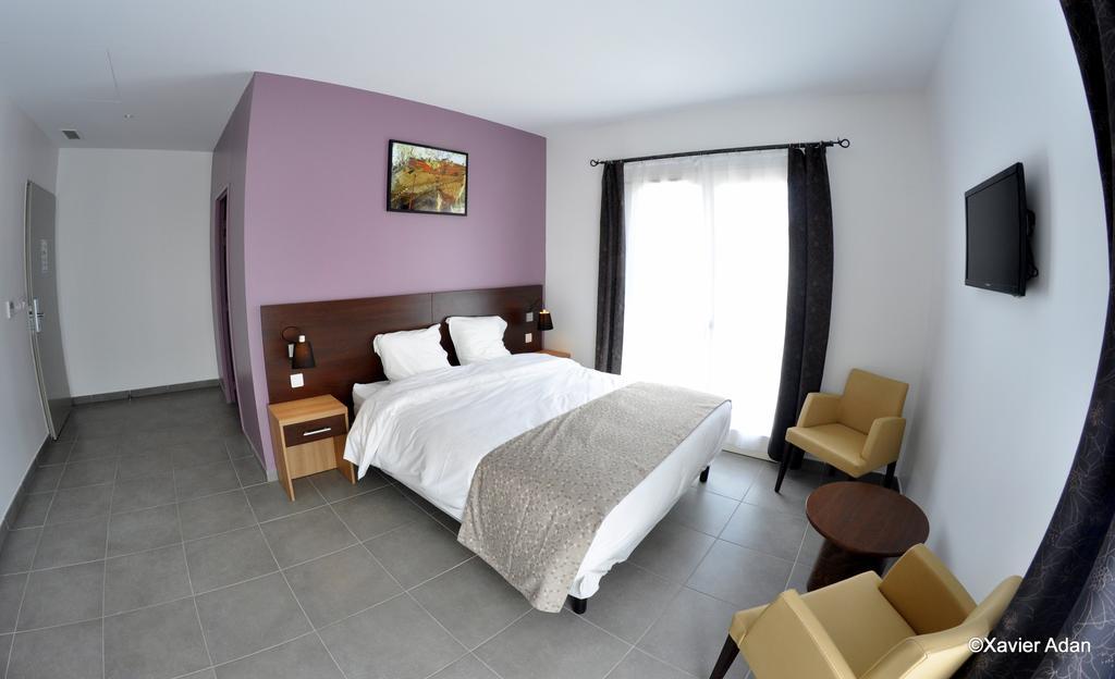 Douce France Hotel Cuxac-d'Aude Bagian luar foto